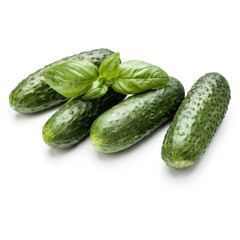 Cucumber vegetable and basil leaves isolated on white background cutout