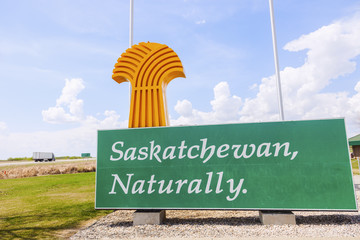 Welcome to Saskatchewan - sign and flags - 169343449