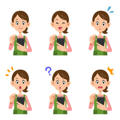 スマートフォン　操作　女性　主婦　表情
