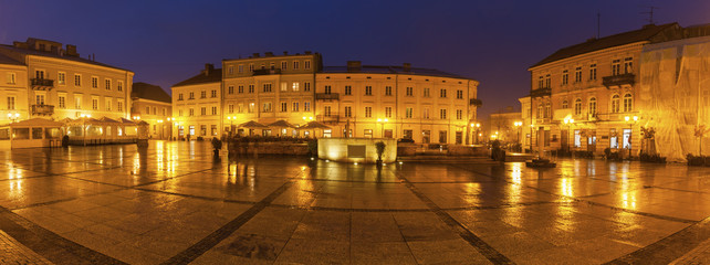 Fototapeta na wymiar Rain on Market Square in Piotrkow Trybunalski