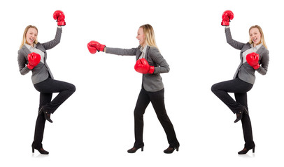 Woman businesswoman with boxing gloves on white