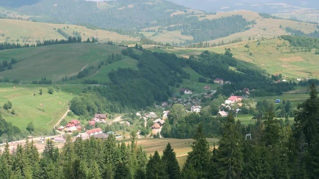 view on the village in mountain area summer season, ukraine, carpathians
