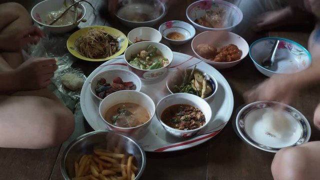 Time lapse of hand eating variety traditional Thai food cuisine
