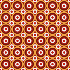 Seamless colorful pattern made by vivid circles of red, orange and white, concentric with small circles between the big ones