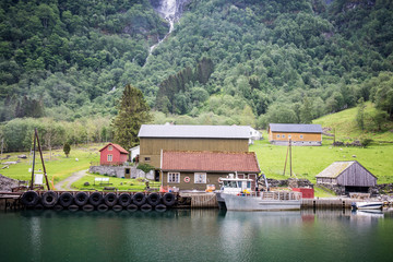 House and Boat on Fjord