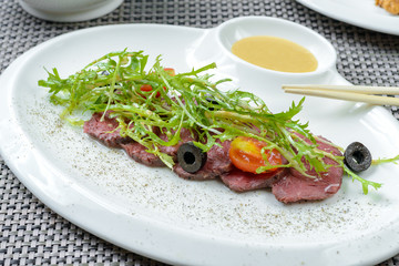 Beef with prepared dandelion