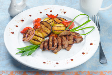 Fried meat with grilled vegetables