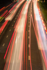 Many car lights on the street.