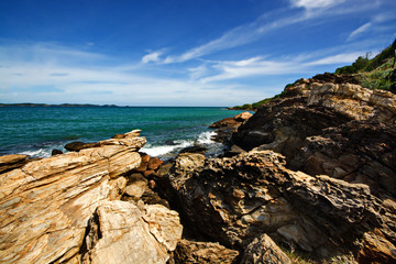 Amazing sea with blue summer wave and rocks. Summer sea background.