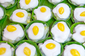 Thai sweet dessert on green banana background. Thai traditional dessert.