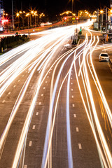 Many car lights on the street.