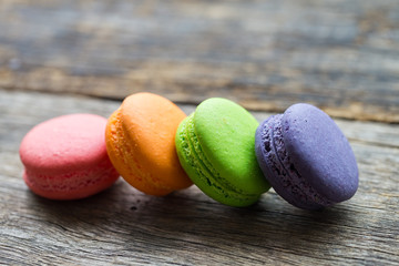 macaroons on wooden floor