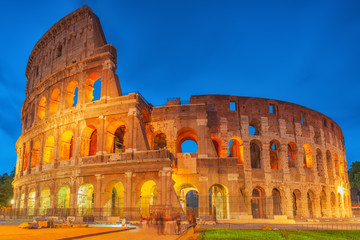 Fototapeta na wymiar Beautiful landscape of the Colosseum in Rome- one of wonders of the world in the evening time. Italy.