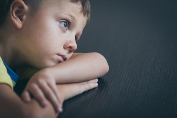 Portrait of one sad little boy.