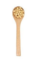Dried soy beans in a wooden spoon.