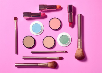 Set of decorative cosmetics on light colorful background