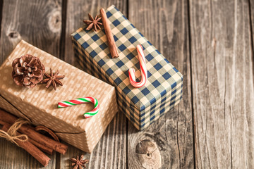 Christmas gift boxes on wooden background