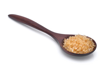 brown cane sugar in wooden spoon isolated on white background