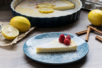 Homemade cheesecake with raspberries and lemon. Delicate dessert for coffee