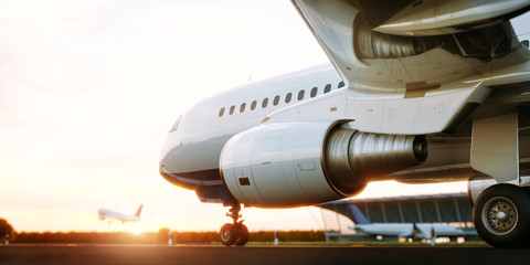 White commercial airplane standing on the airport runway at sunset. Passenger airplane is taking off. Airplane concept 3D illustration.