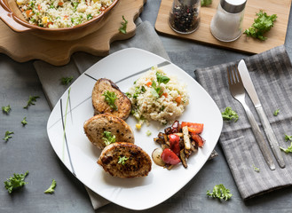 Pork medallions with grilled vegetables and vegetable couscous. Excellent food