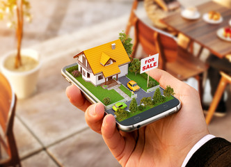 Smartphone application for online searching, buying, selling and booking real estate. Unusual 3D illustration of beautiful house on smart phone in hand - 169368835