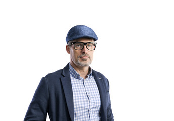 Mature hipster man in shirt, jacket and hat. Studio shot, isolat