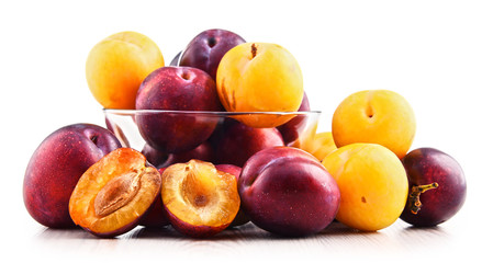 Composition with plums isolated on white background