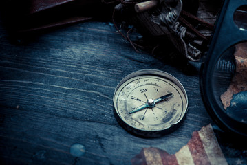 Columbus day and world map with compass