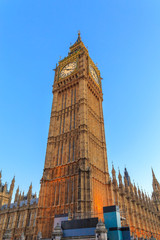 Obraz premium Big Ben clock tower London, isolated against sky, vertical, London is The most visited cities around the world.