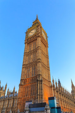 Big Ben clock tower London, isolated against sky, vertical, London is The most visited cities around the world.