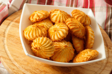 homemade shortbread biscuit on the plate with tablecloth