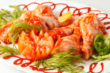 Raw marinade chicken legs with greens. Meat
