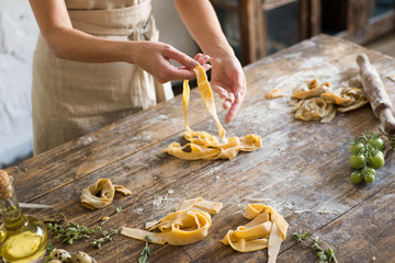 Raw homemade pasta and hands