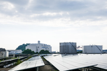 modern factory and solar panels.