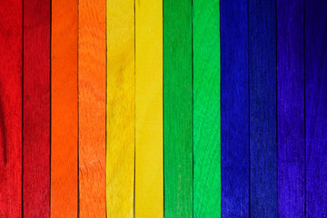 Natural Wooden Rainbow colored. Painted Wooden Multicolored.Rainbow wooden Background.