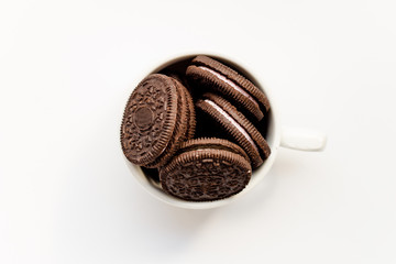 Chocolate Cookies With Cream on White Background, Top view