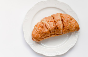 French croissant on white background, Top view