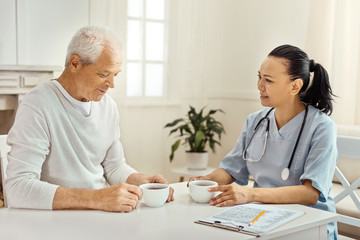 Fototapeta premium Nice elderly man telling his story