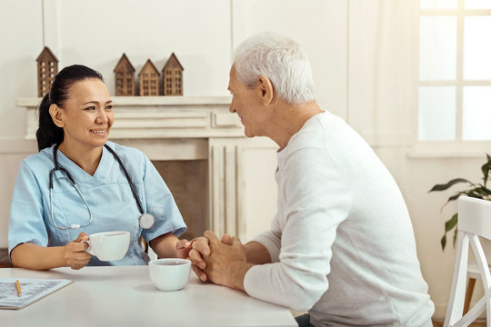 Delighted Aged Man Having An Interesting Conversation