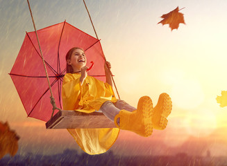 child with red umbrella - obrazy, fototapety, plakaty