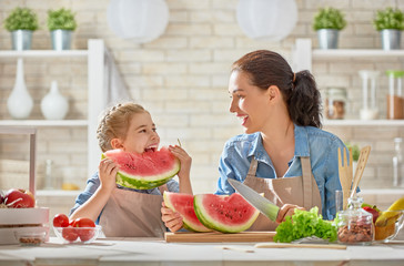 Happy family in the kitchen.