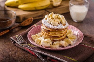 American pancakes with banana, chocolate