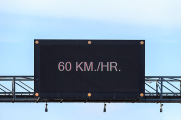 Traffic sign on the road showing limit of speed in Phuket, Thailand
