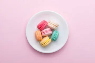 Foto op Canvas Colorful pastel cake macaron or macaroon on plate. © makistock