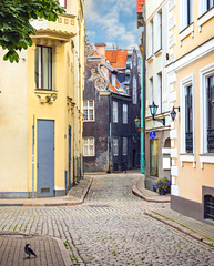 Fototapeta na wymiar Morning in medieval street in old city of Riga, Latvia, Europe. 