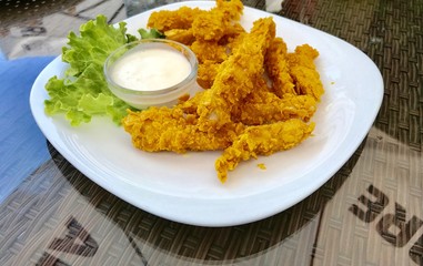 Fried chicken bites with cornflakes
