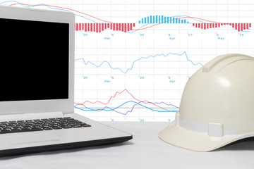 Engineers hats and laptop computers