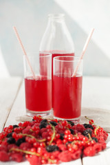 Drink of berries on a light background
