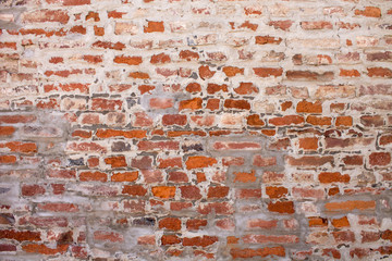Red and white old worn brick wall texture background